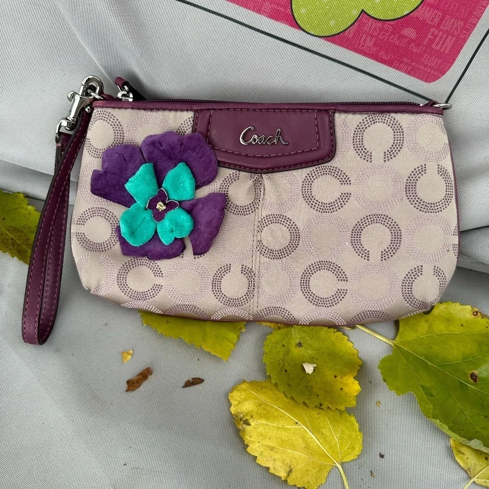 Coach Wristlet with suede flowers. Upstyled for a fresh new look. 9.25x5.5 x1”